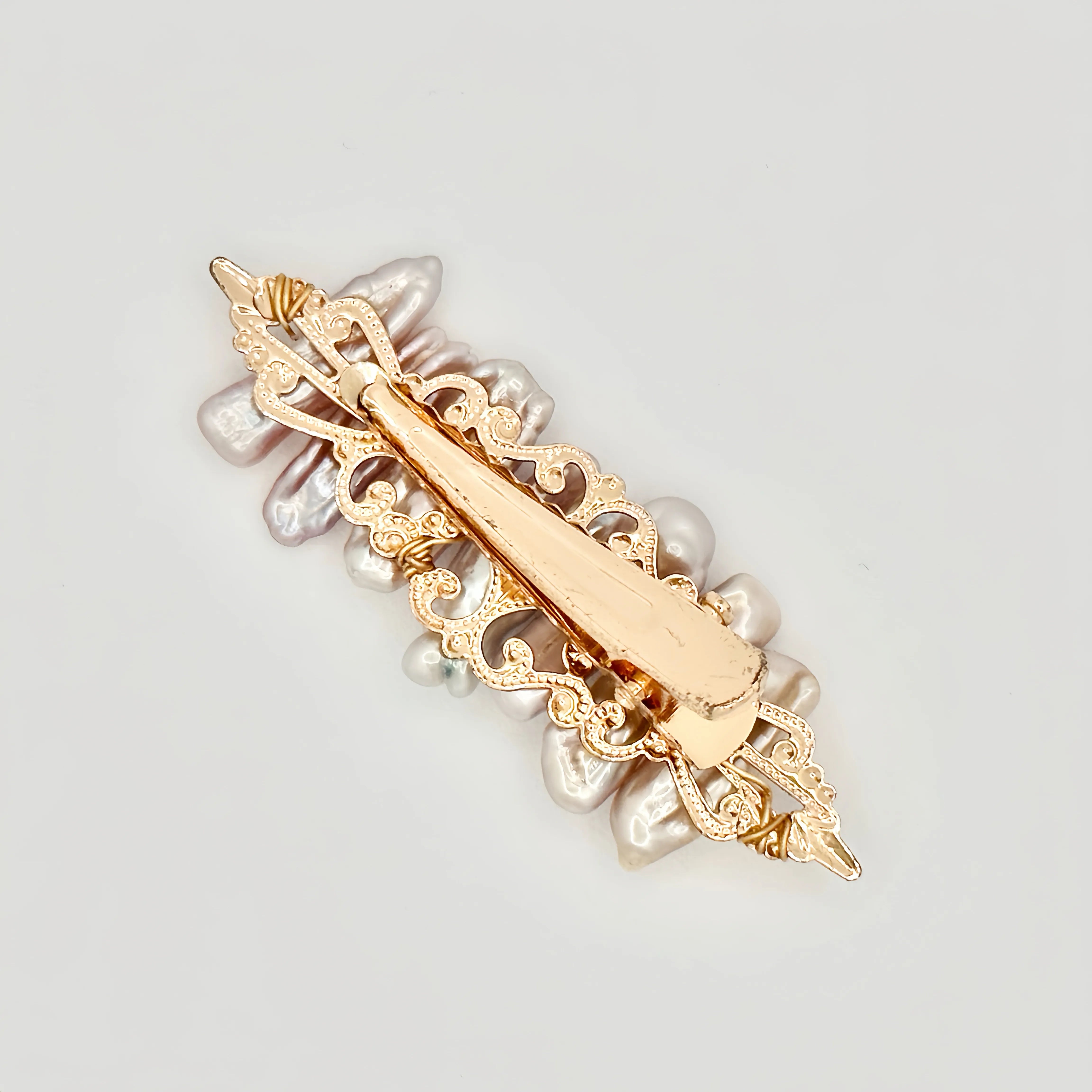 Discover the elegance and charm of our Pearl Hair Accessories – Angel  Barocco